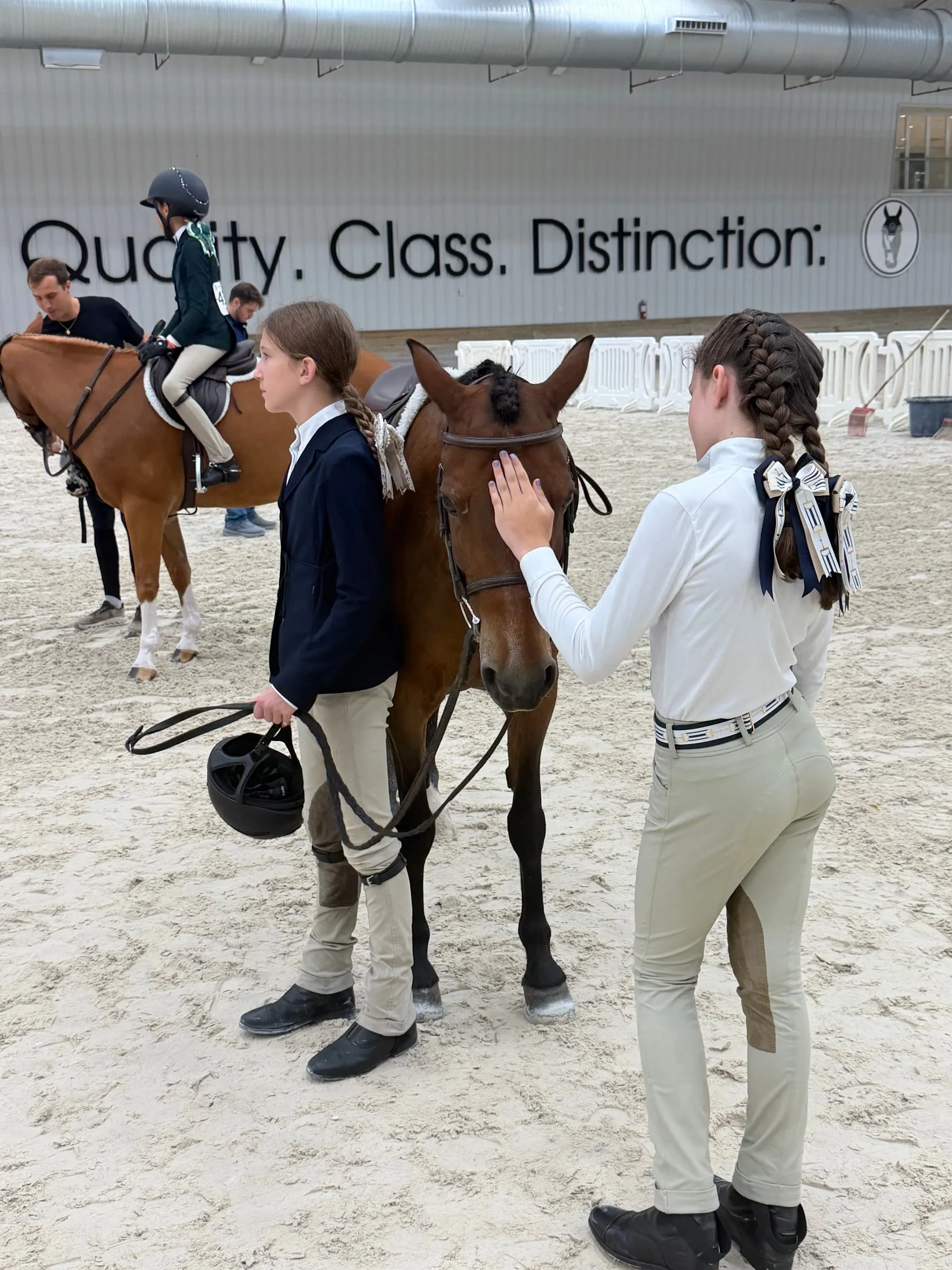 Young riders with their pony in the World Equestrian Center arena